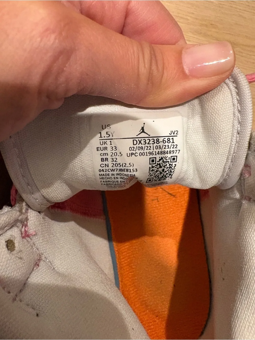 Nike Kids Pink and White High-Top Sneakers with Orange Logo